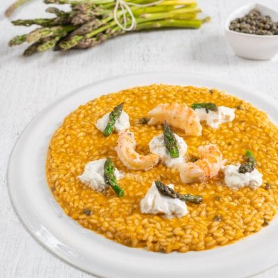 Risotto con scampi burrata e asparagi