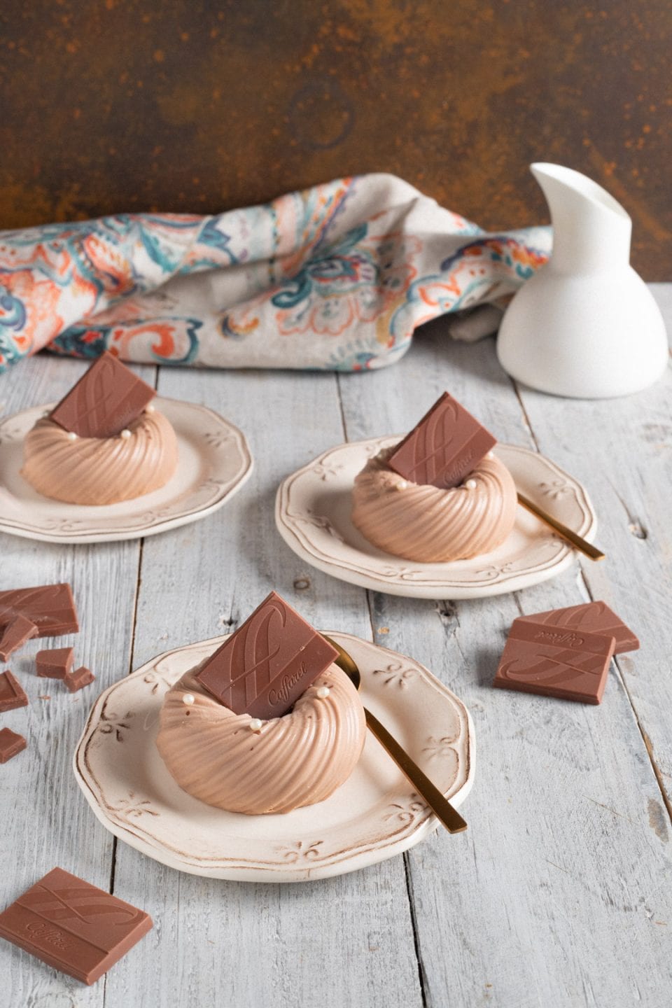 Piccole ciambelle di panna cotta al gianduia