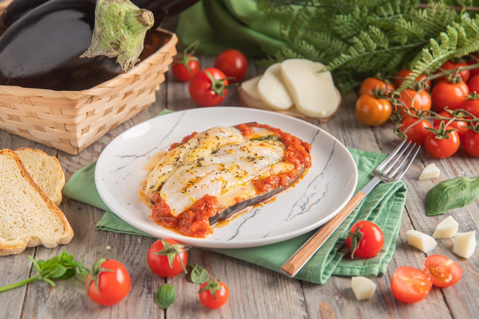 Filetti di cernia alla parmigiana Filetto con melanzana alla mediterranea